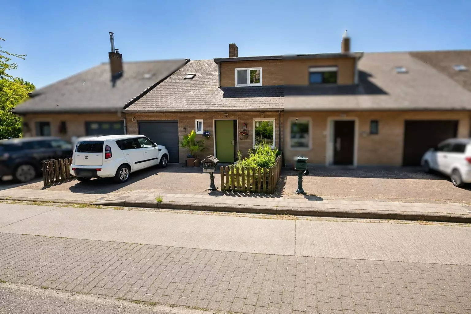 Maison mitoyenne avec jardin ensoleillé et garage à Ostdunkerque